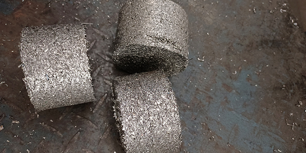 含油金屬屑的“免罪金牌”——金屬碎屑壓餅機